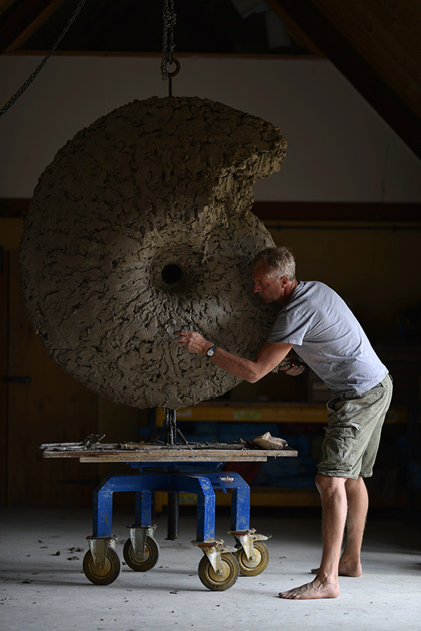 Sculptor Hamish Mackie working in his studio